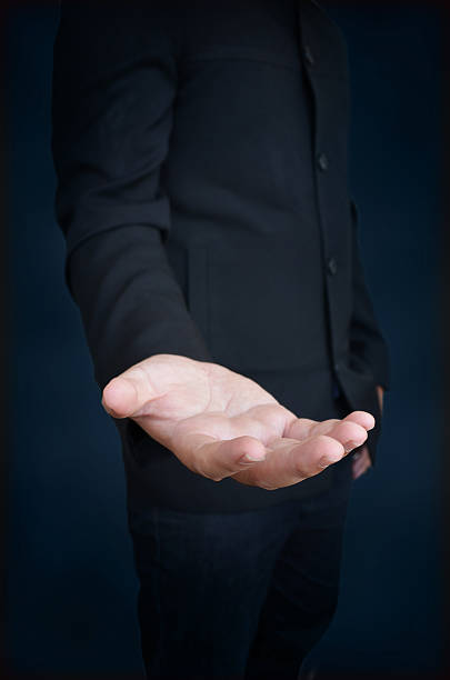 istock an empty hand of a businessman 179222187
