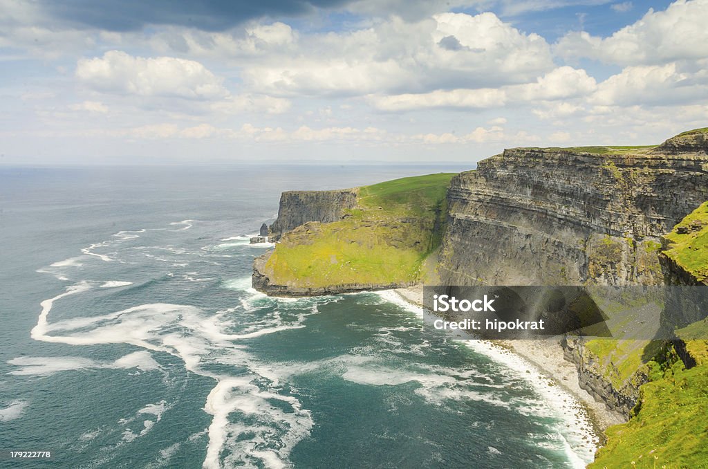 Cliffs of Moher The Cliffs of Moher are located in the parish of Liscannor at the south-western edge of the Burren area near Doolin, which is located in County Clare, Ireland. Beauty In Nature Stock Photo