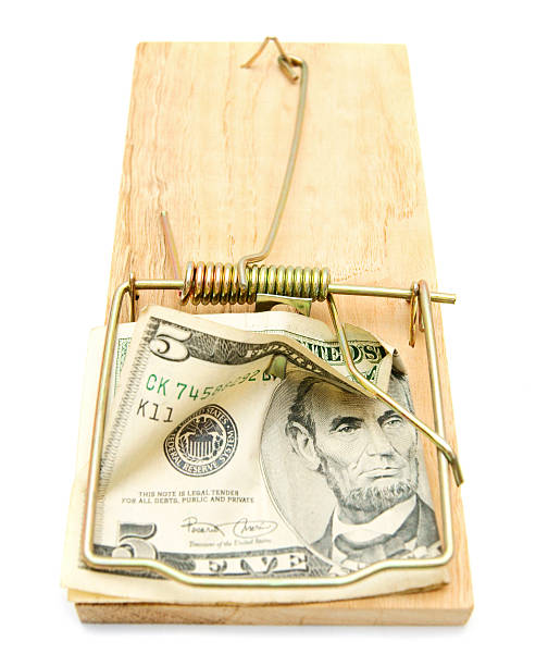 istock Money in mousetrap. 179224375