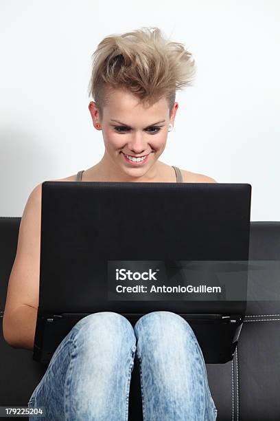 Fashion Teenager Girl Sitting Browsing In A Laptop Stock Photo - Download Image Now - Adolescence, Adult, Alternative Lifestyle