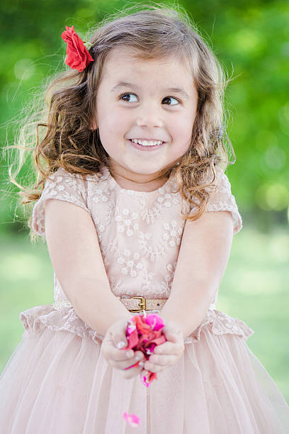 istock Girl giving flowers 179226353