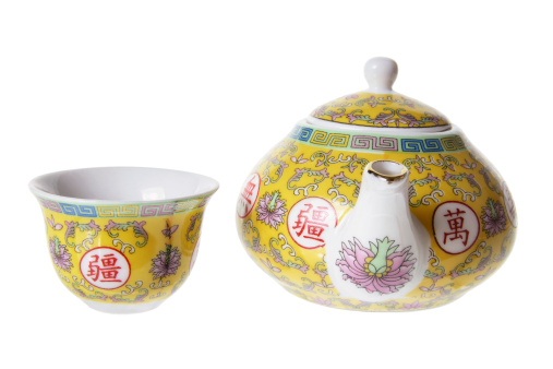 Chinese Teapot and Cup on White Background