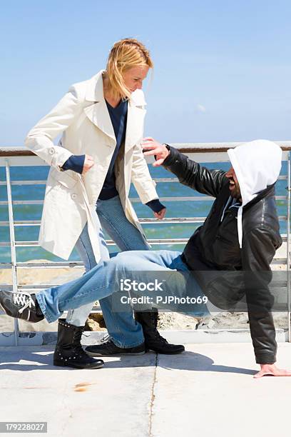 Woman Defending Herself Against Assailant Stock Photo - Download Image Now - Abuse, Adult, Adults Only