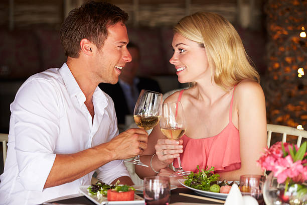 A couple enjoying a meal in a restaurant