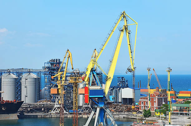 istock Cargo crane, ship and grain dryer 179228819