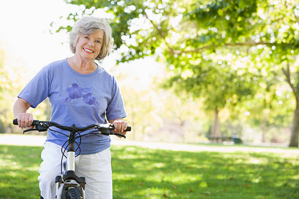 istock Senior woman on cycle ride 179229125