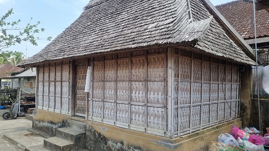 Traditional Balinese house called Bale Manten. Bale Manten is a rectangular building and is divided into two parts (left and right). Used as a residence for parents and daughters. Using bamboo as wall