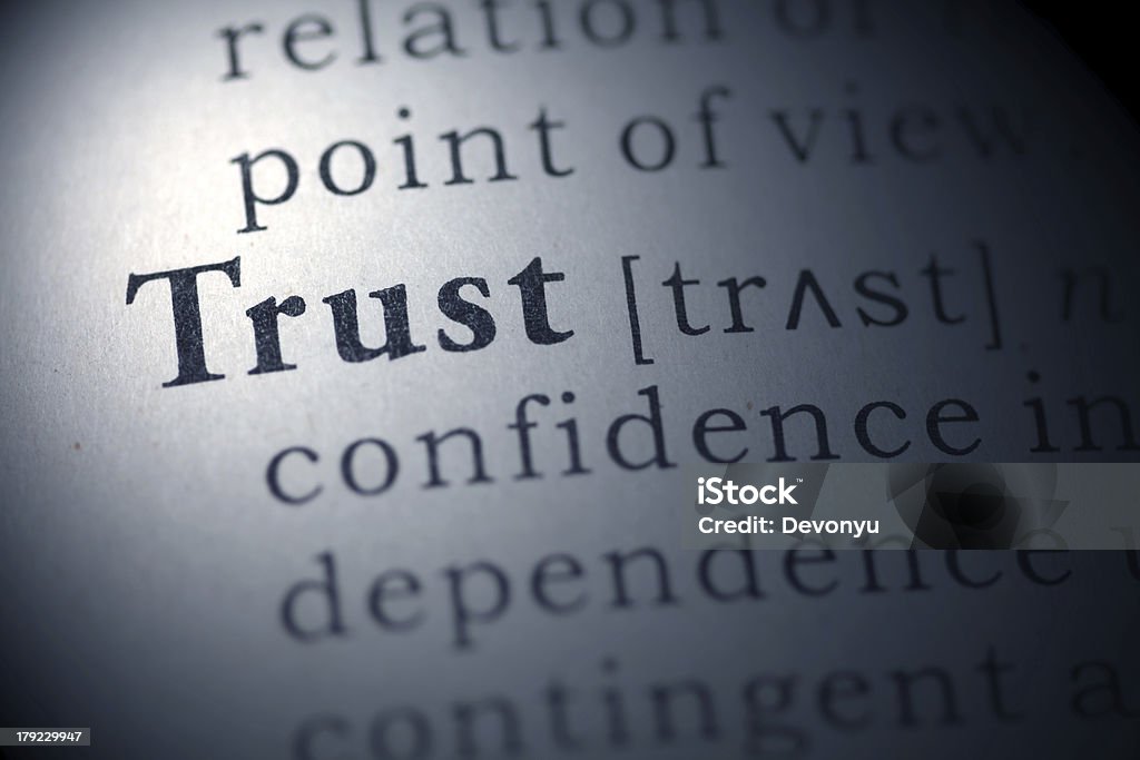 Trust Fake Dictionary, Dictionary definition of the word Trust.. Blue Stock Photo