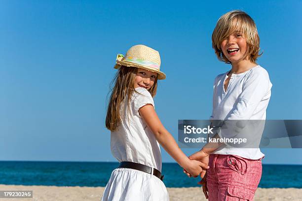 Cute Boy And Girl Holding Hands Stock Photo - Download Image Now - Boys, Girls, Summer