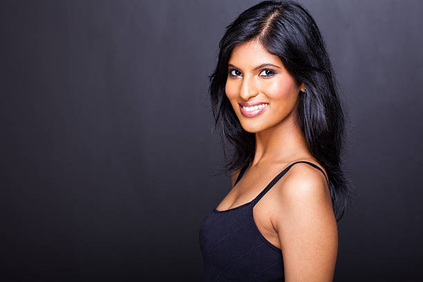 istock smiling young glamour hispanic woman 179230792