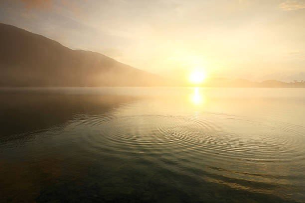 istock Misty at lake morning light 179231665