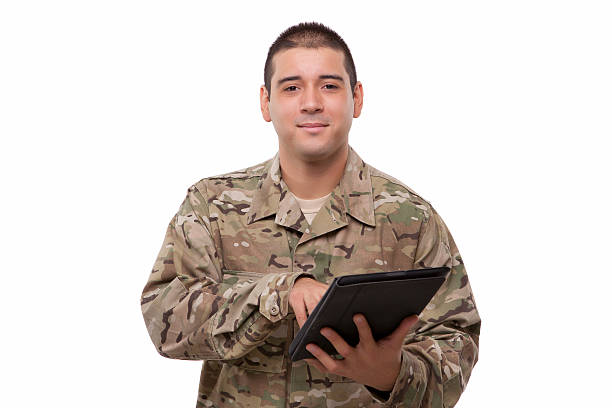 istock Smiling soldier with a digital tablet 179231740