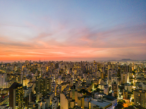 Building lights turned on in the early evening in São Paulo