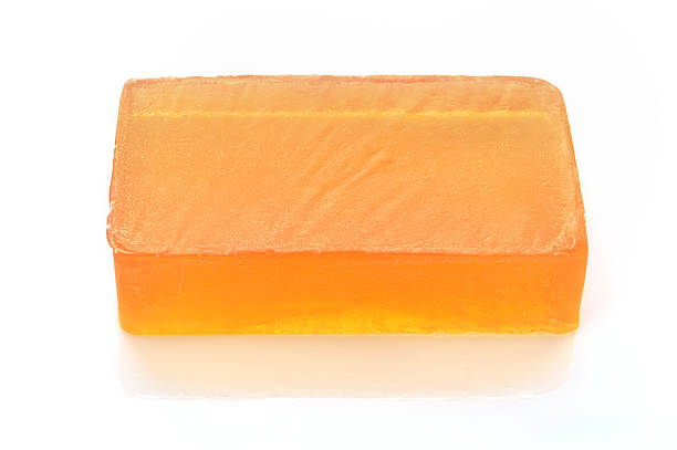 istock Orange handmade glycerin soap on white. 179232601