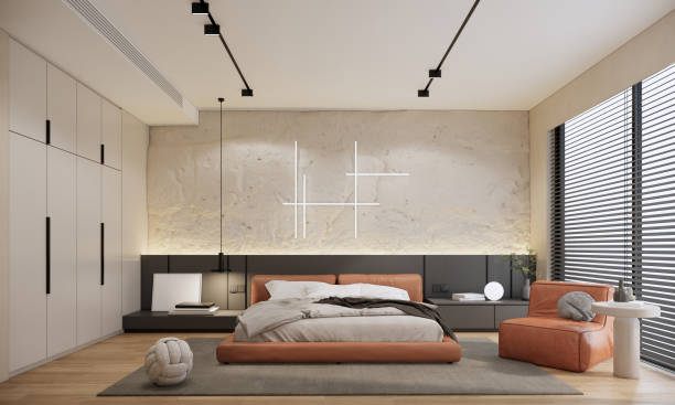 istock Modern bedroom interior design and decoration with orange bed, grey headboard and carpet, wall decoration and blinds window. 3d rendering showcase apartment. 1792330434