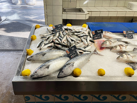 Central fish market with displays and counters with various seafood.in Athens, Greece. Retail place of healthy food.