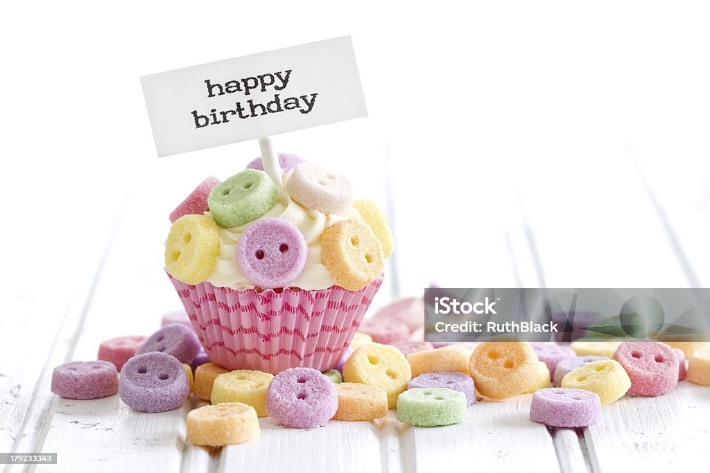 Birthday cupcake Cupcake with Happy Birthday pick Button - Sewing Item Stock Photo