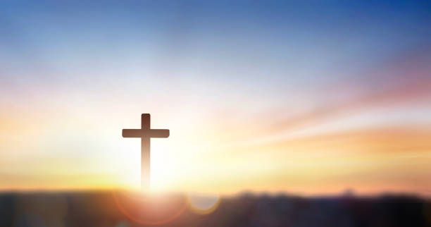 istock christian cross on hill outdoors at sunrise 1792333541