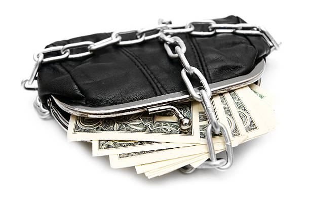 istock Money in purse with chain. 179233517