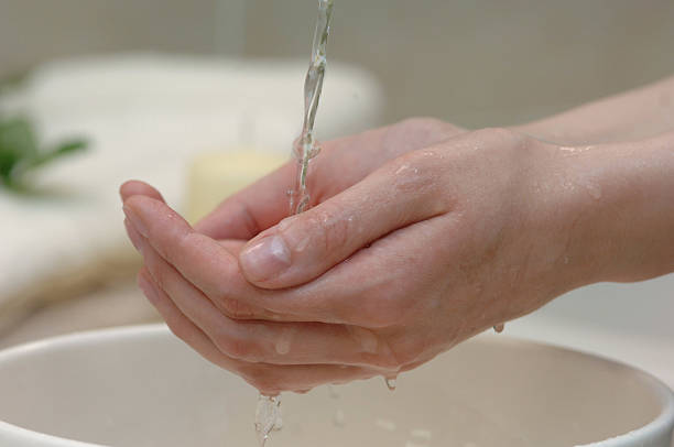 istock Close up of Washing Hands with water 179233592