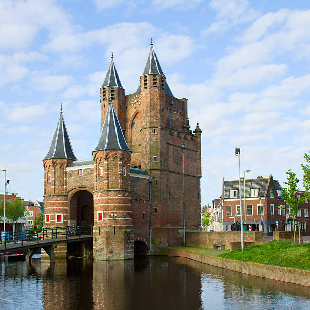 the gate of amsterdam, haarlem, holland - haarlem stockfoto's en -beelden