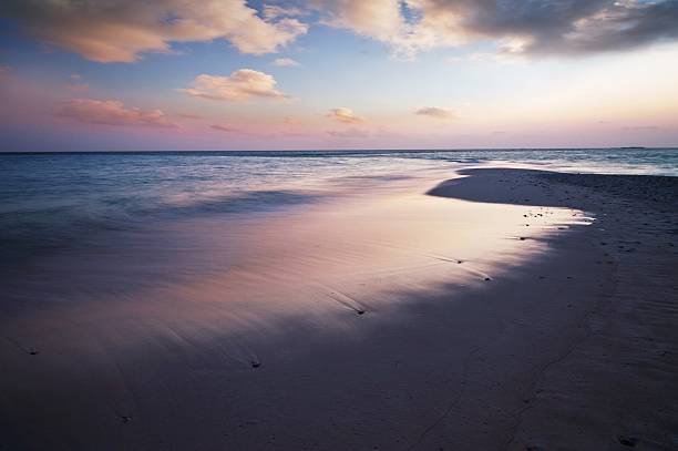 istock beautiful sunset on the beach 179234142