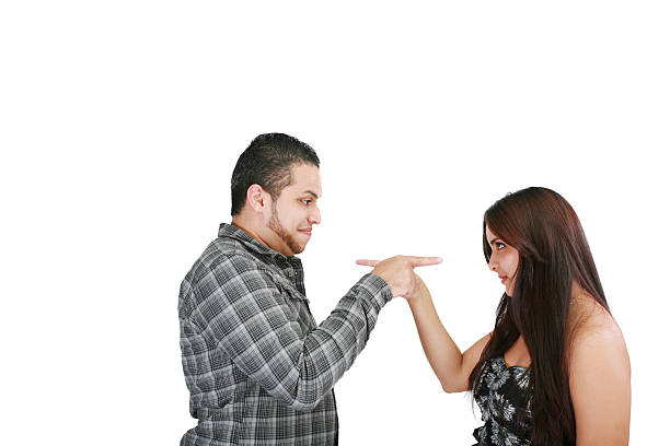 istock Young couple pointing at each other 179234211