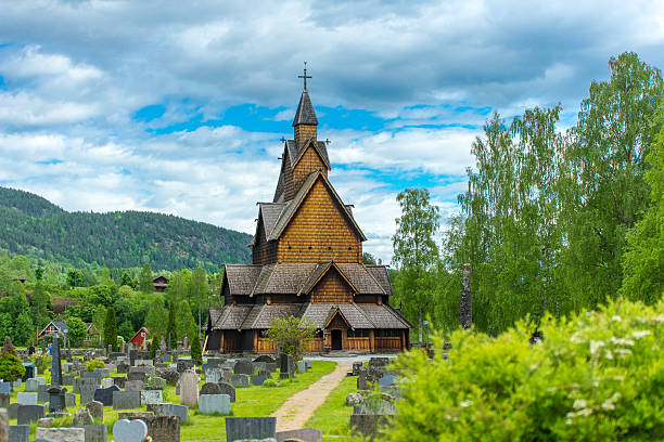 Church of Heddal in Norway A shot of Heddal stave church with his cementary. heddal stock pictures, royalty-free photos & images