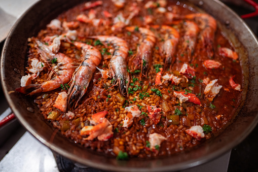 Traditional spanish seafood paella with prawns (gambas)