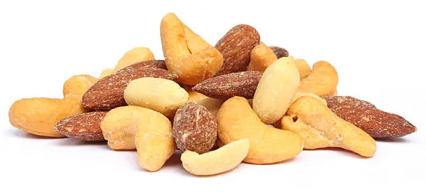 Mixed nuts over white background