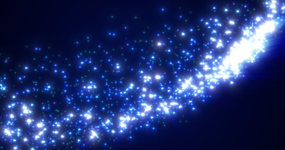 Abstract blue background of small bright glowing particles of energy stars, star dust from a comet tail.