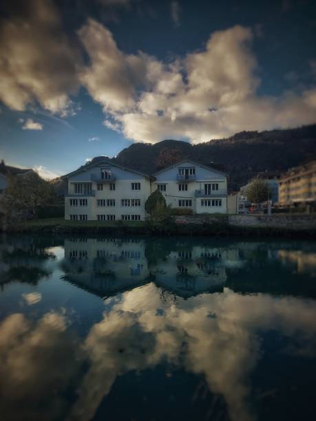 A water body with Buildings alongside it