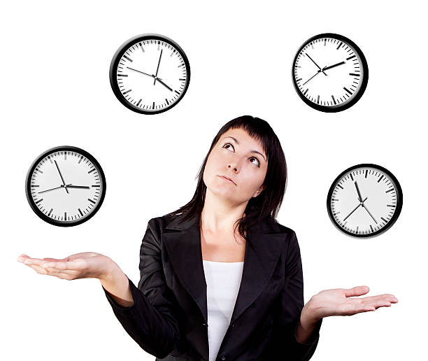 istock Businesswoman juggling clocks. 179236805