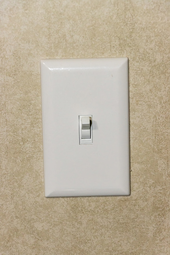Indoor light switch in the on position