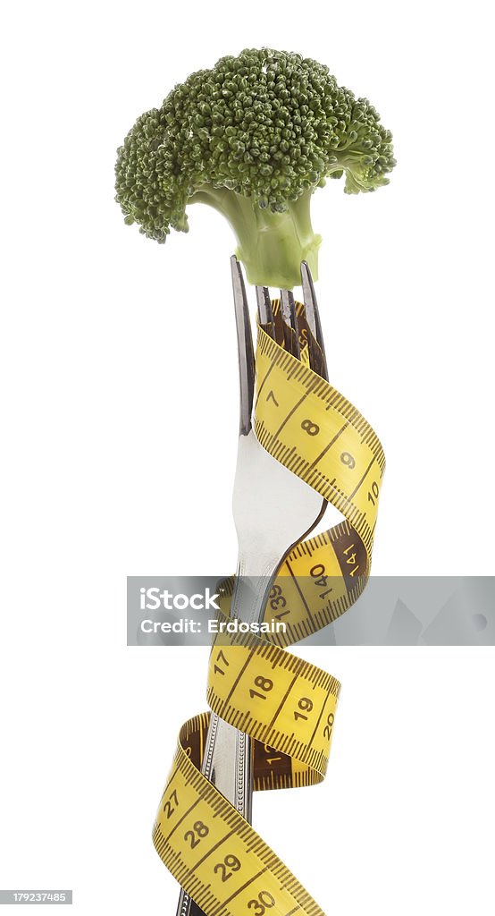 Forcella con broccoli isolato su bianco - Foto stock royalty-free di Alimentazione non salutare