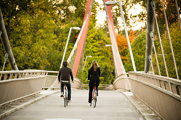 istock Couple Cycling on Bridge 179238184