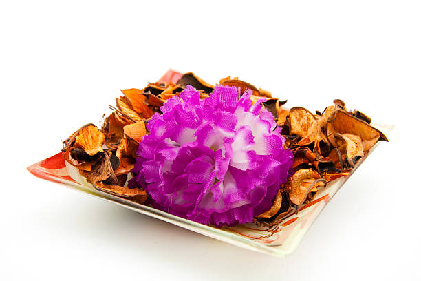 istock Potpourri with flower in glass bowl 179238651