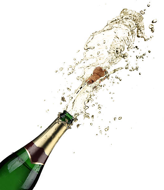 istock Champagne spraying out after bottle popped 179239193
