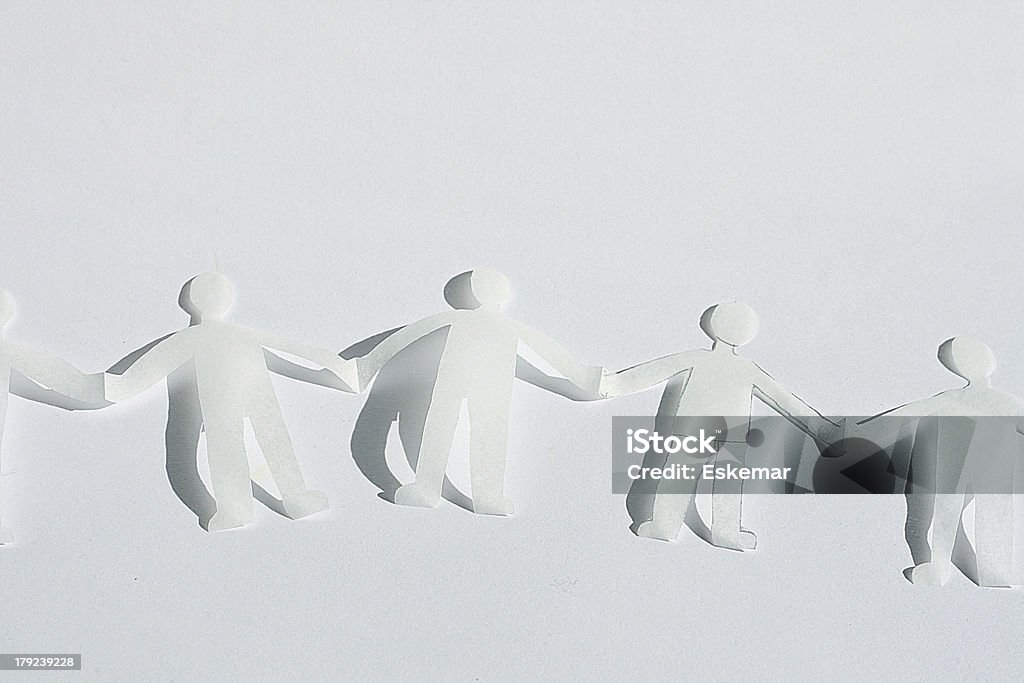 Cadena humana - Foto de stock de Tira de figuritas de papel libre de derechos
