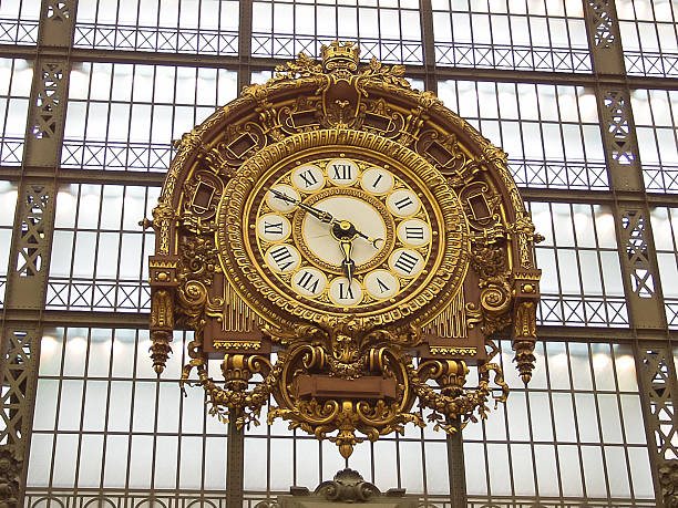Old clock hanging on ancient market wall. Ancona, Italy.