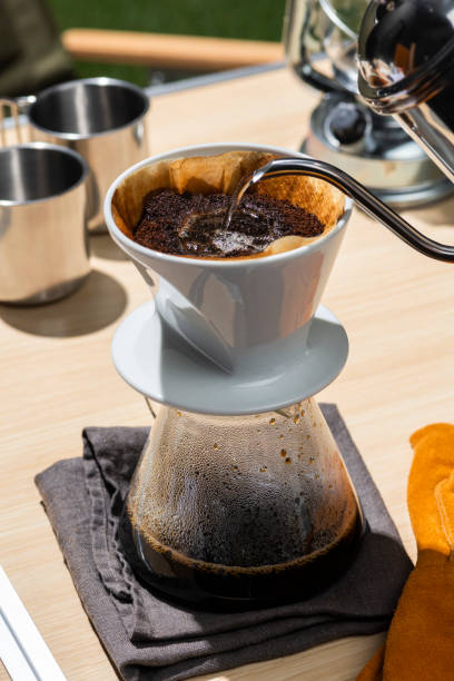 istock Delighting in Drip Coffee Amidst Outdoor Camping Bliss 1792396821