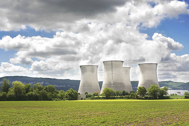 Vibrant Colored Image of two cooling towers of a nuclear power facility in Tennessee, USA on a Sunny Autumn Day. A facility like this creates jobs for the local economy, provides carbon-free electricity to the region, and reduces greenhouse gas emissions.