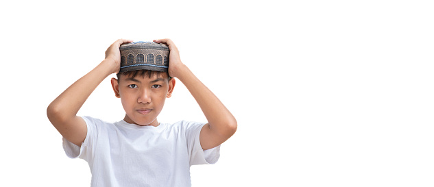 Asian muslim or islamic boy isolated on white background with clipping paths.