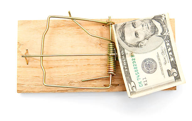 istock Mousetrap with money. On a white background. 179241672