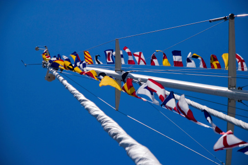 flag on the mast yacht