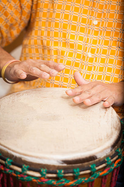 istock male playing on a djembo drum 179242864