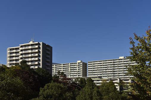 Housing complexes, blue sky background. Tokyo Japan.