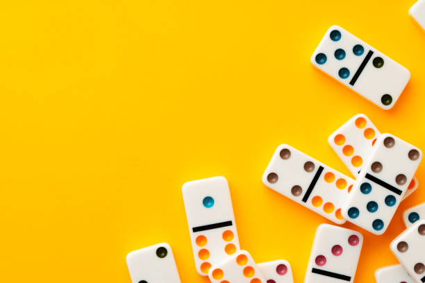 istock Domino tiles on yellow background studio shot 1792438270