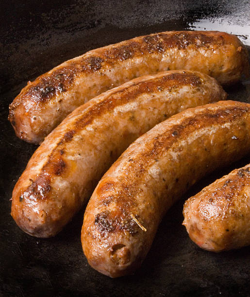 istock Sausages in a black frying pan 179244060