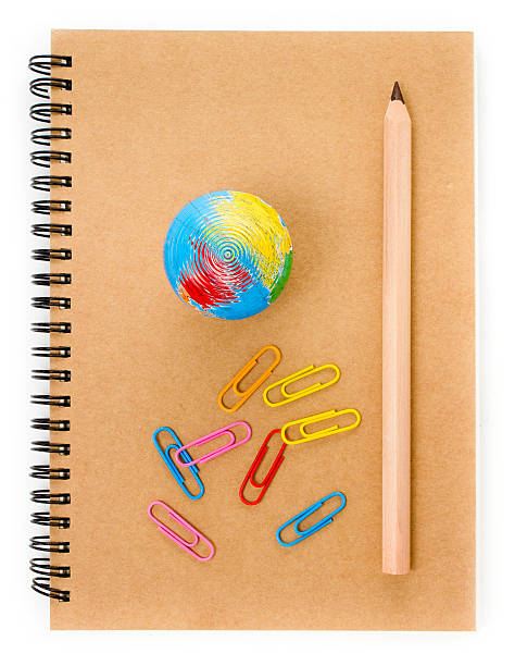 istock School supplies with Globe, clip and notebook  on white 179244237